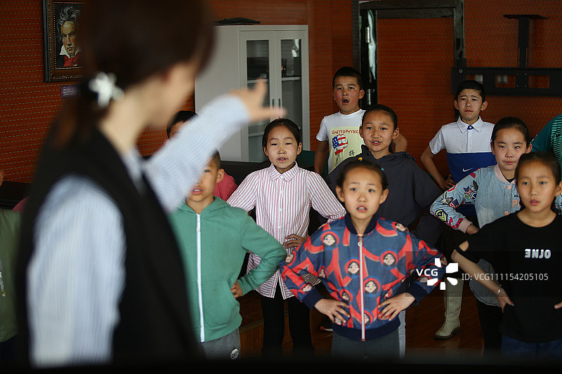图片故事:探访小学生合唱团 梦想站上国际合唱